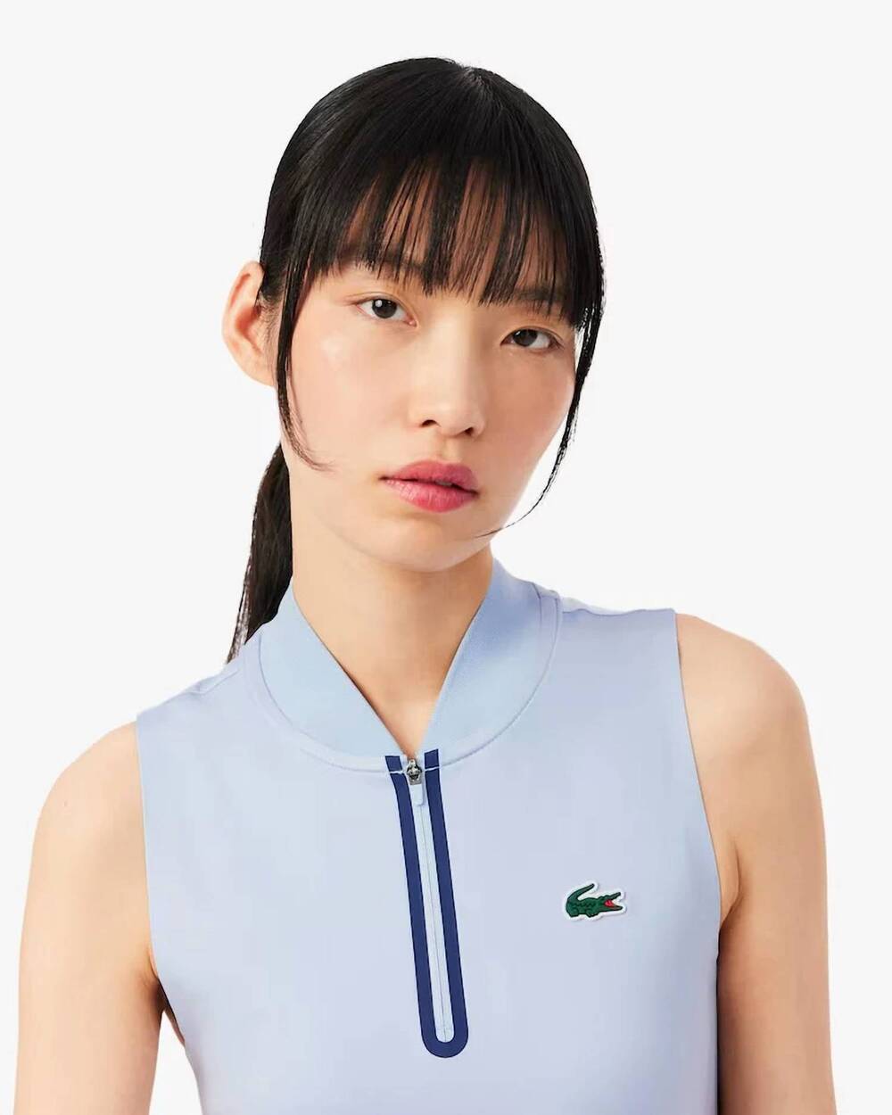 NEW LACOSTE sleeveless ultra dry stretch tennis polo in light blue